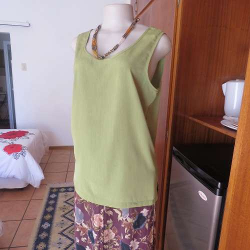 Silky shiny avo green mottled cami with scooped neckline by IN CLOTHING in size 36/12. As new
