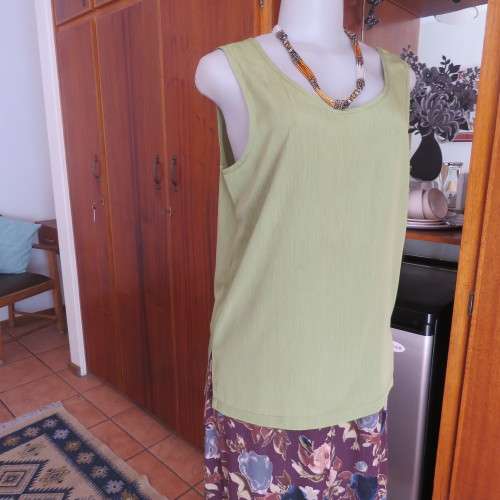 Silky shiny avo green mottled cami with scooped neckline by IN CLOTHING in size 36/12. As new
