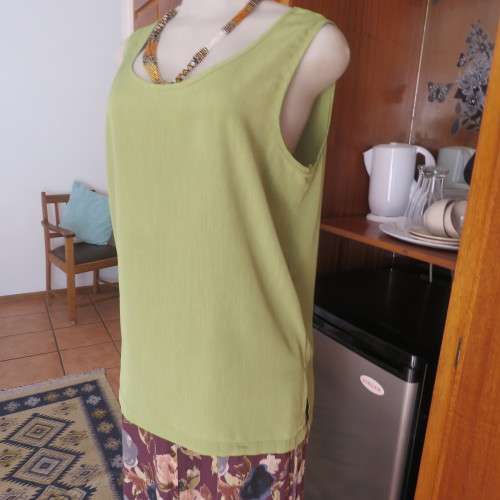 Silky shiny avo green mottled cami with scooped neckline by IN CLOTHING in size 36/12. As new