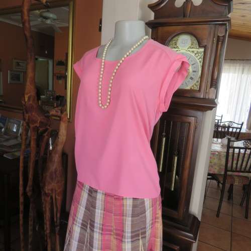 Crimson colour slip over top with short zip at back.By FOREVER NEW in size 36/12. Armhole cuffs.