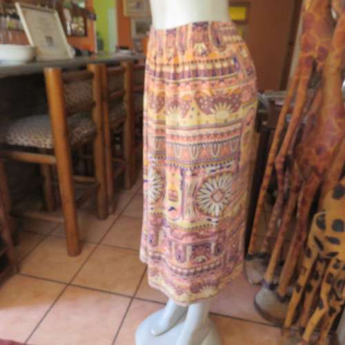 Baroque printed creased viscose skirt. Size 36/12. Low calf length. Elasticated waist.Good condition