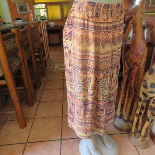 Baroque printed creased viscose skirt. Size 36/12. Low calf length. Elasticated waist.Good condition
