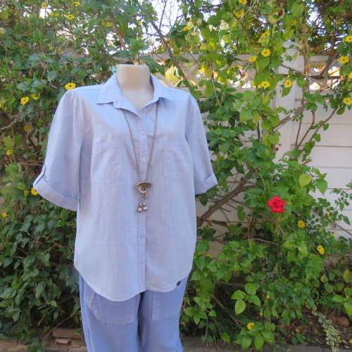 High quality light blue short sleeve shirt by David Jones. Size 42/18. 100% cotton. Never used.