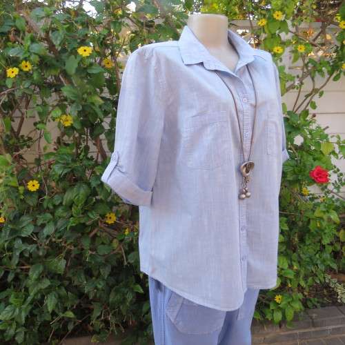 High quality light blue short sleeve shirt by David Jones. Size 42/18. 100% cotton. Never used.