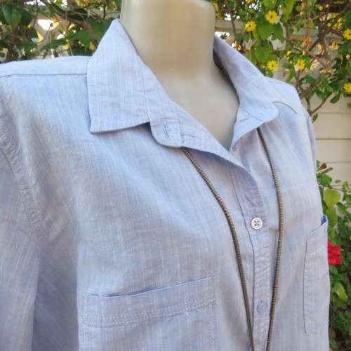 High quality light blue short sleeve shirt by David Jones. Size 42/18. 100% cotton. Never used.