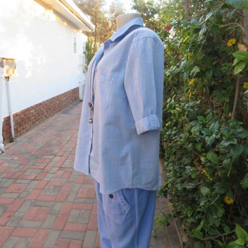 High quality light blue short sleeve shirt by David Jones. Size 42/18. 100% cotton. Never used.
