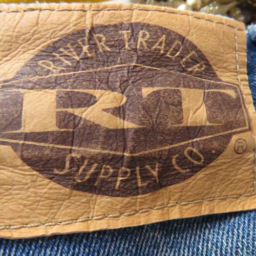 Ladies high waist boyfriend denim jeans. Skinny legs. Size 34/10. By RIVER TRADER. Distressed look.