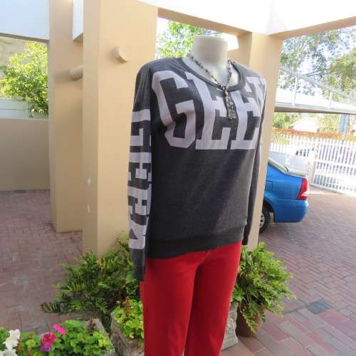 GEEK long sleeve grey top with white logo. Slip over.  Size 36/12. By Atmosphere. Good condition.