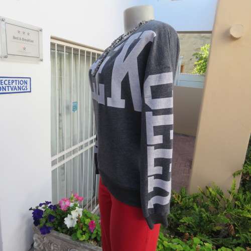 GEEK long sleeve grey top with white logo. Slip over.  Size 36/12. By Atmosphere. Good condition.