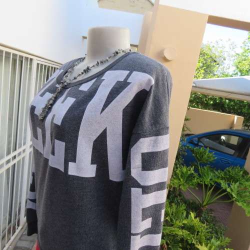 GEEK long sleeve grey top with white logo. Slip over.  Size 36/12. By Atmosphere. Good condition.