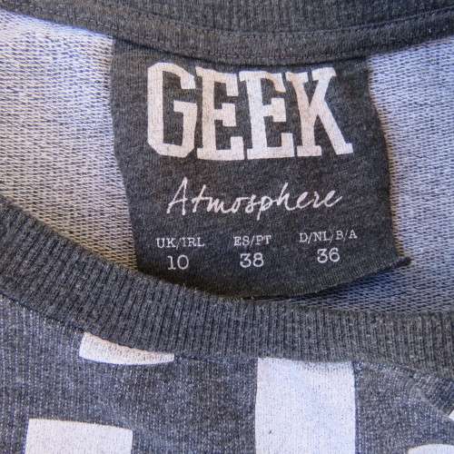 GEEK long sleeve grey top with white logo. Slip over.  Size 36/12. By Atmosphere. Good condition.