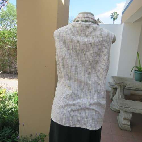Cool button down sleeveless top. 100% bubble cotton. Size 38/14. By MERIEN HALL CASUALS. As new.