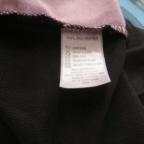 Cute little black netting top. Pale lilac underlay on front. Scooped neckline. Size 34/10. as new.