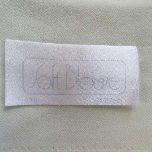 Light mint green short sleeve jacket/cover-up low V-front. Size 34/10 by SOFT BLOUSE. New condition.