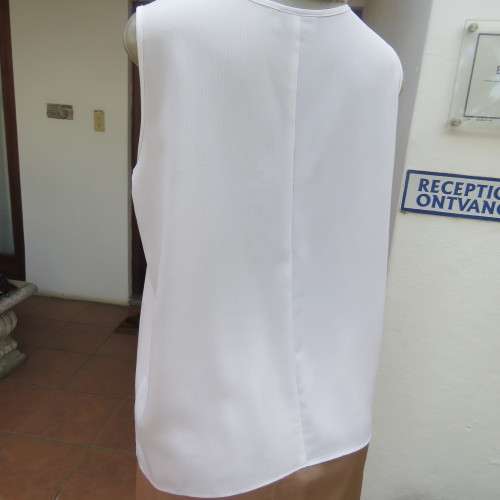 Stunning DELTON white sleeveless top. Amazing see-through ribbon decoration. Size 36/12. As new.