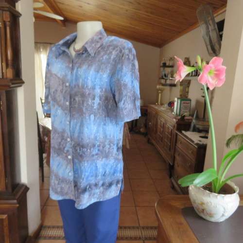 Stunning fully embroidered top in medley of blues. Button down Size 36/12. By ML CLASSICS. As new.