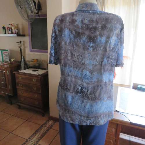 Stunning fully embroidered top in medley of blues. Button down Size 36/12. By ML CLASSICS. As new.