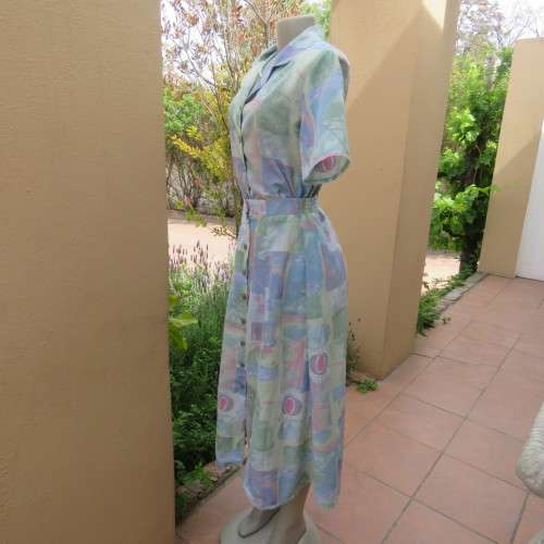 As new two piece skirt suite Short sleeve top A-line paneled skirt Size 34-10 By ` Saint Honor`
