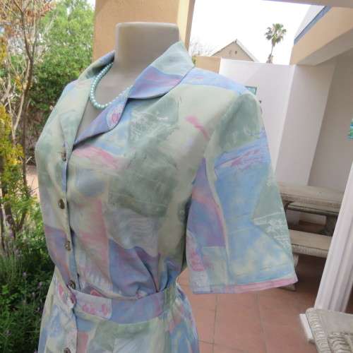 As new two piece skirt suite Short sleeve top A-line paneled skirt Size 34-10 By ` Saint Honor`