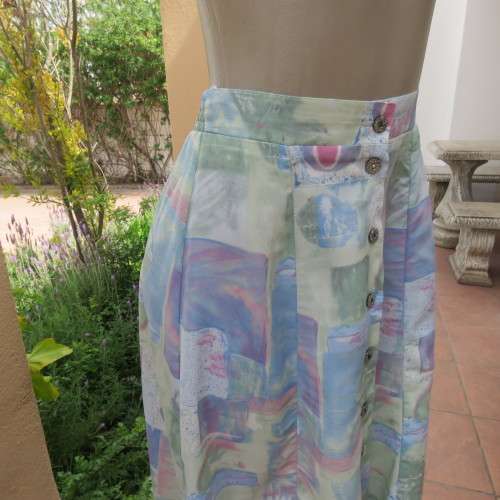As new two piece skirt suite Short sleeve top A-line paneled skirt Size 34-10 By ` Saint Honor`