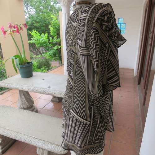 Beautiful slip-over geometric printed loose top V-neckline Size 48-24 By `Donatella` New condition