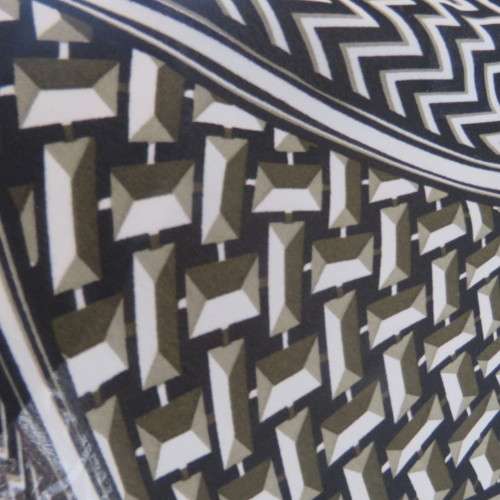 Beautiful slip-over geometric printed loose top V-neckline Size 48-24 By `Donatella` New condition