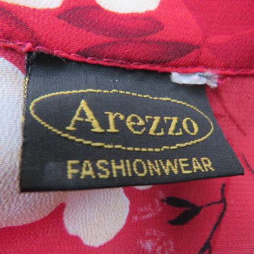 Eyecatching cherry red short sleeve cream and dirty pink roses top Size 34-10 By `Arezzo` As new