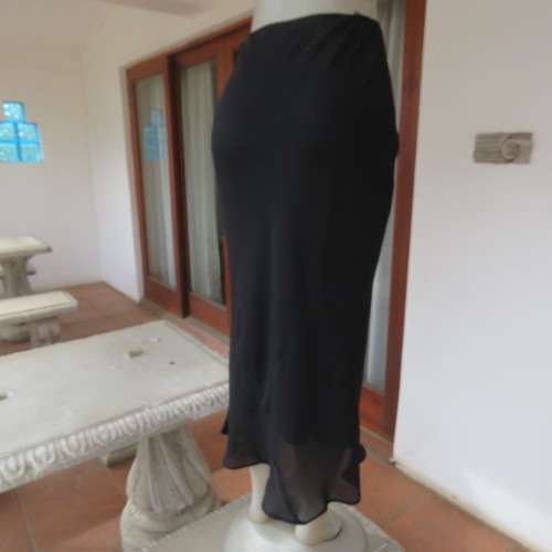 Sleek fully lined black sheer polyester maxi skirt Size 32-8 By `Massumi` New condition