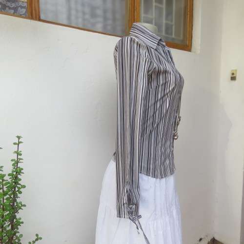 Black and white vertical striped long sleeve shirt V-neckline.and collar  Size 32/8 By Insync`As new