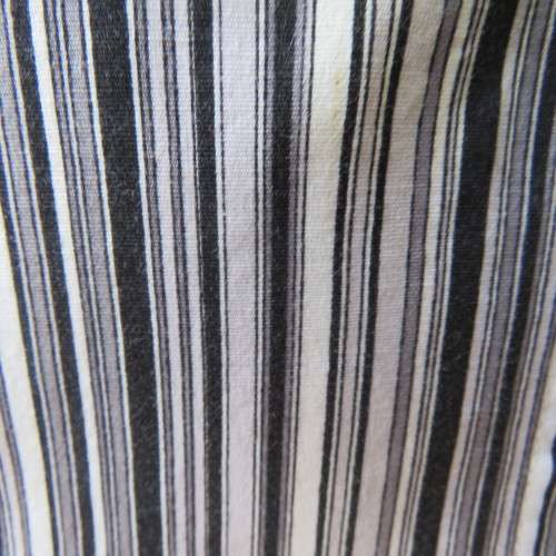 Black and white vertical striped long sleeve shirt V-neckline.and collar  Size 32/8 By Insync`As new