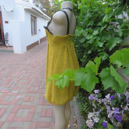 Unique knitted fully lined mustard colour bubble dress. By `Tsega`.  Size 34. Good condition.