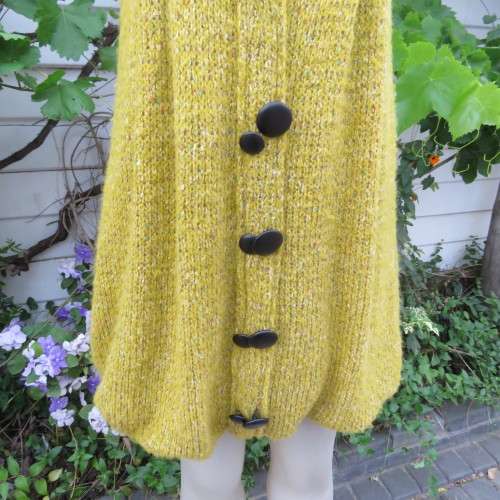 Unique knitted fully lined mustard colour bubble dress. By `Tsega`.  Size 34. Good condition.