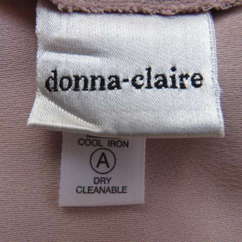 Blush pink pencil skirt size 44/20 by `Donna Claire`Elasticated waist back. Flat front. As new.