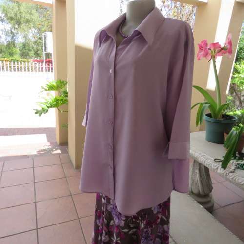 Smart lavender colour button down top with open colla. By `Smat`. In size 48/24. New condition.