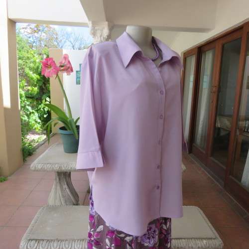Smart lavender colour button down top with open colla. By `Smat`. In size 48/24. New condition.