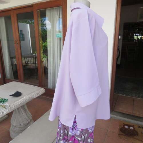 Smart lavender colour button down top with open colla. By `Smat`. In size 48/24. New condition.