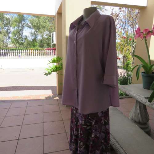 Smart lavender colour button down top with open colla. By `Smat`. In size 48/24. New condition.