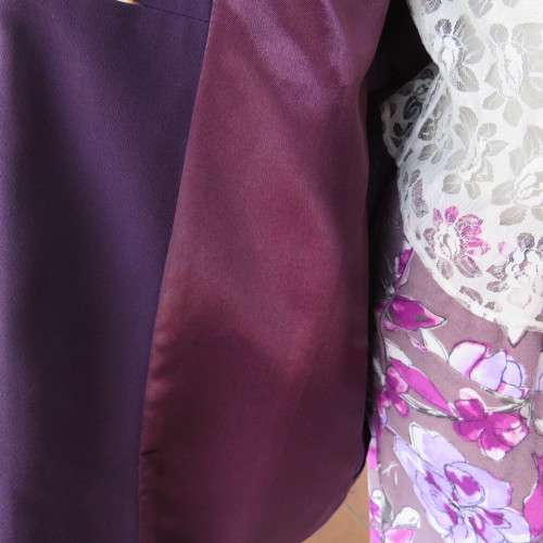 Elegant dark purple long sleeve jacket. Fully lined. By `Truworths`. In size 32/8. New condition.