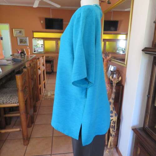 Box style jade colour textured satin short sleeve top. Size 44/20. Owner made. Very good condition.