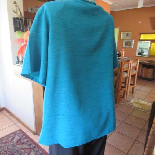 Box style jade colour textured satin short sleeve top. Size 44/20. Owner made. Very good condition.