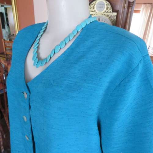 Box style jade colour textured satin short sleeve top. Size 44/20. Owner made. Very good condition.