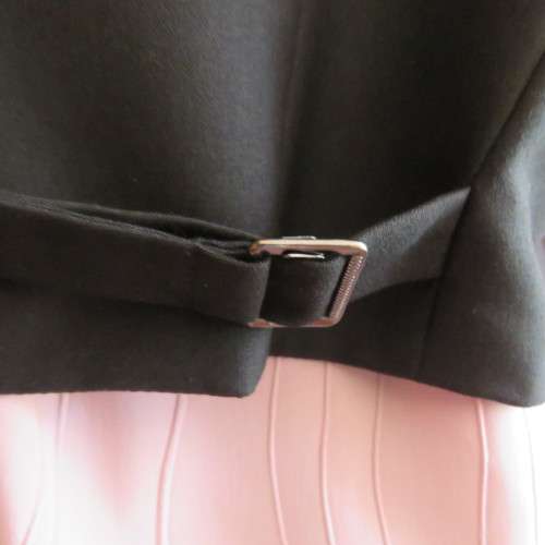 Ladies black tuxedo waistcoat. Tiny dummy front pocket. By `Legit`. In size 40/16. New condition.