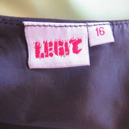 Ladies black tuxedo waistcoat. Tiny dummy front pocket. By `Legit`. In size 40/16. New condition.