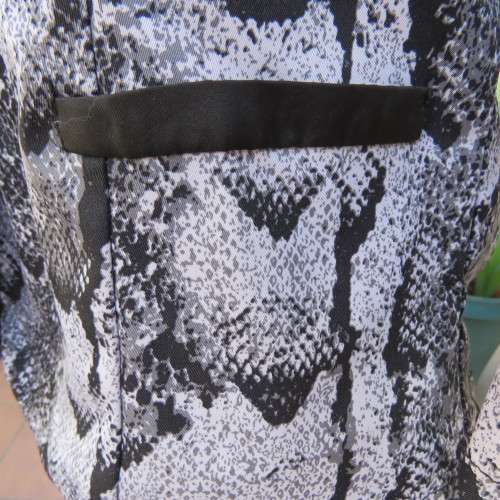 Chic black and white animal print long sleeve jacket. Open collar. Size 30/6. By `Massumi`. As new.