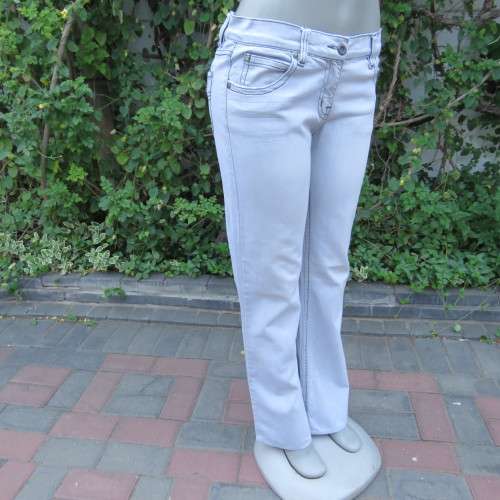Sexy light blue denim jeans. Easy bootcut style by `Paris`. Size 36/12. Used but in good condition.