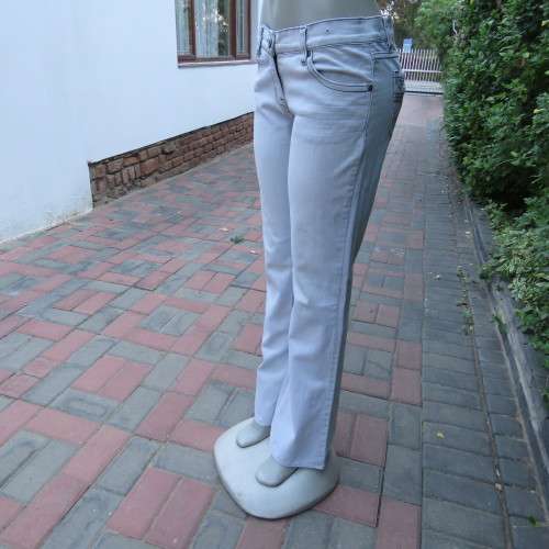 Sexy light blue denim jeans. Easy bootcut style by `Paris`. Size 36/12. Used but in good condition.