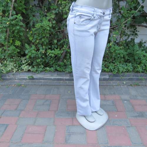 Sexy light blue denim jeans. Easy bootcut style by `Paris`. Size 36/12. Used but in good condition.