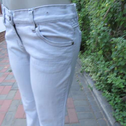 Sexy light blue denim jeans. Easy bootcut style by `Paris`. Size 36/12. Used but in good condition.