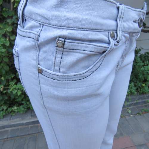 Sexy light blue denim jeans. Easy bootcut style by `Paris`. Size 36/12. Used but in good condition.