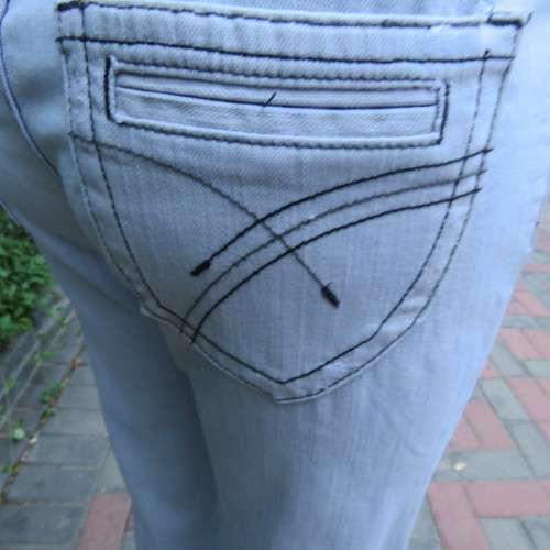 Sexy light blue denim jeans. Easy bootcut style by `Paris`. Size 36/12. Used but in good condition.